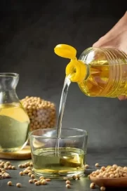 Pouring out kyekyo cooking oil - Agrosahas